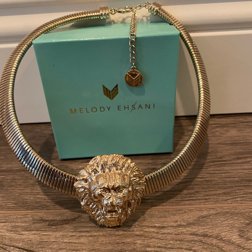 Melody Ehsani lion necklace